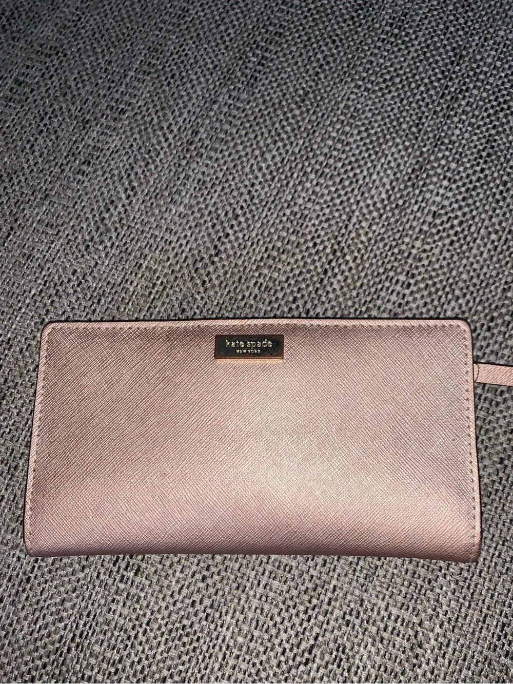 Kate Spade rose gold wallet with callouts